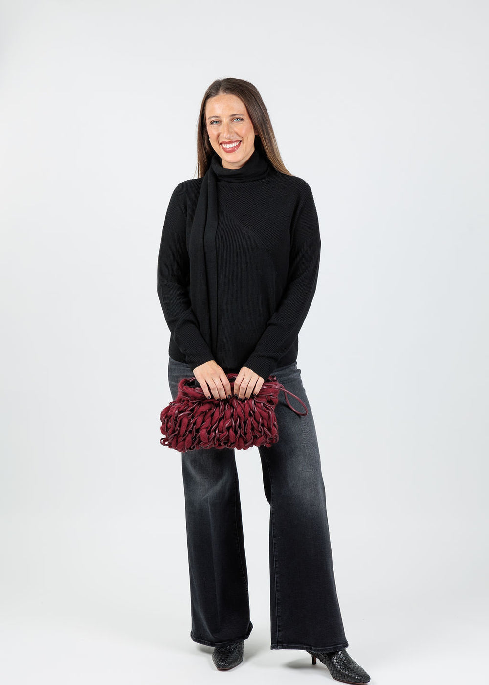 Elliott Lauren Wrap Scarf Sweater in Black paired with Mother The Lil Hustler Roller Sneak Jeans in Not Today Satan available at Barbara Katz