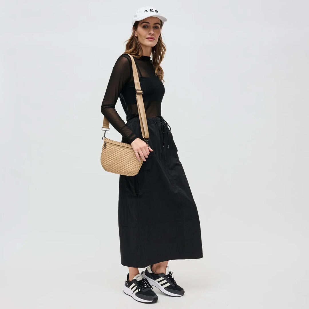 Sol and Selene Ethereal Woven Neoprene Crossbody Bag in Nude available at Barbara Katz
