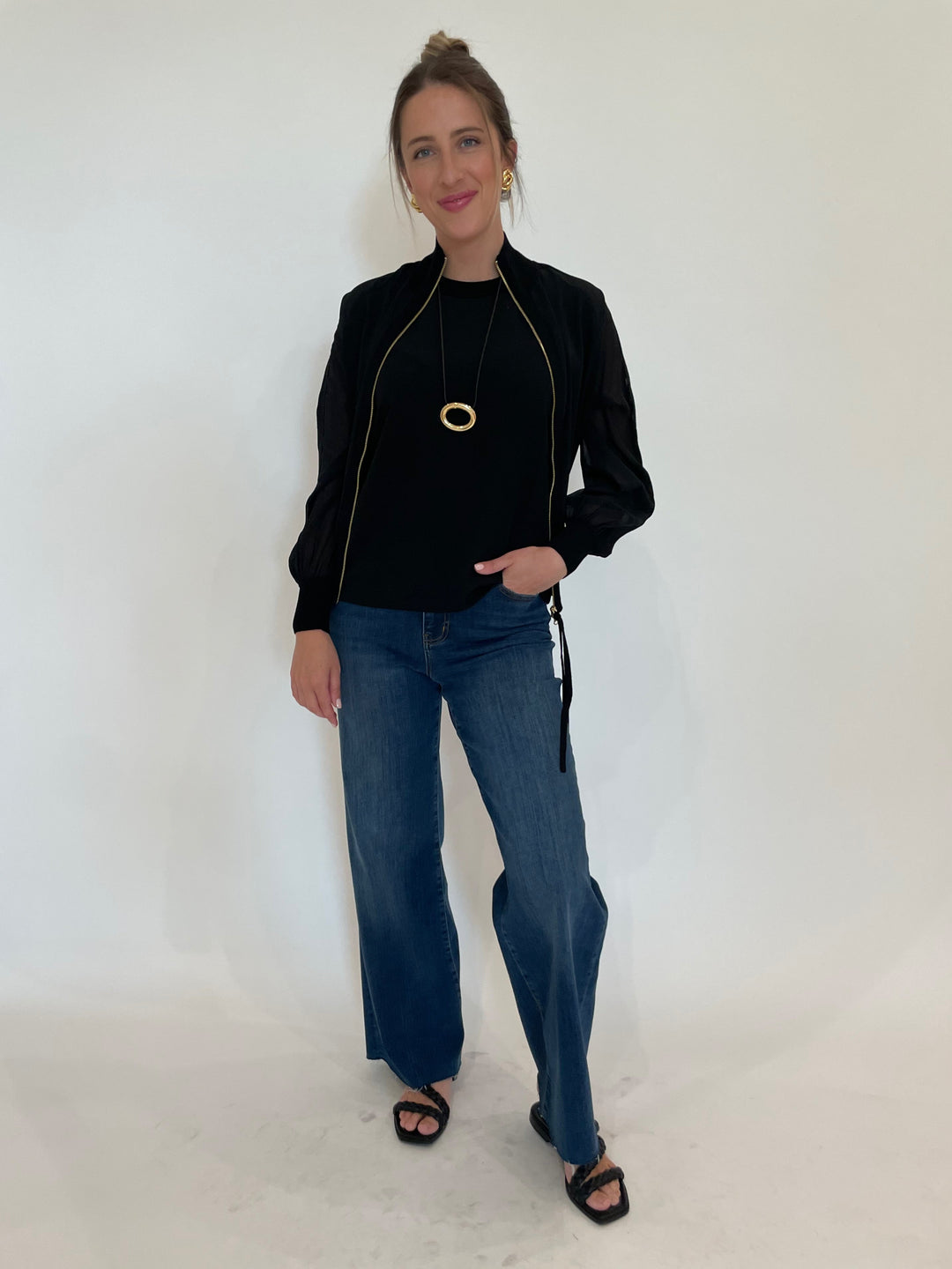 Marella FL VSC Sorona Jacket in Black with Sorona Tank Top underneath, paired with Frame Le Slim Palazzo Raw After Jeans in Lupine, Ben Amun Adobe Necklace and Madeline Clip-On Link Earrings in Gold available at Barbara Katz