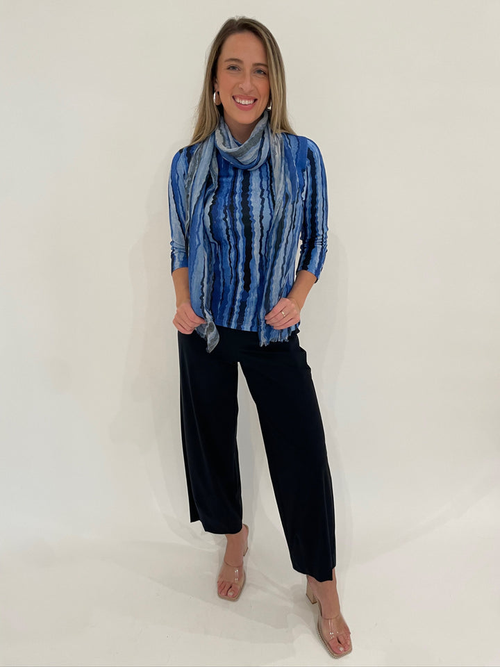 Pashma Contoured Bamboo Silk Lines T-Shirt in Blue with Contoured Lines Scarf, paired with Raffaello Rossi Sally 7/8 High Tech Jersey Pants in Marine, BK Bianca Puffy Earrings in Silver - all available at Barbara Katz