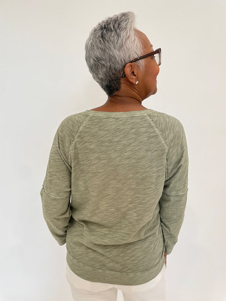 Elliott Lauren Lucy Raglan Sleeve Tee With Seam Detail in Thyme available at Barbara Katz