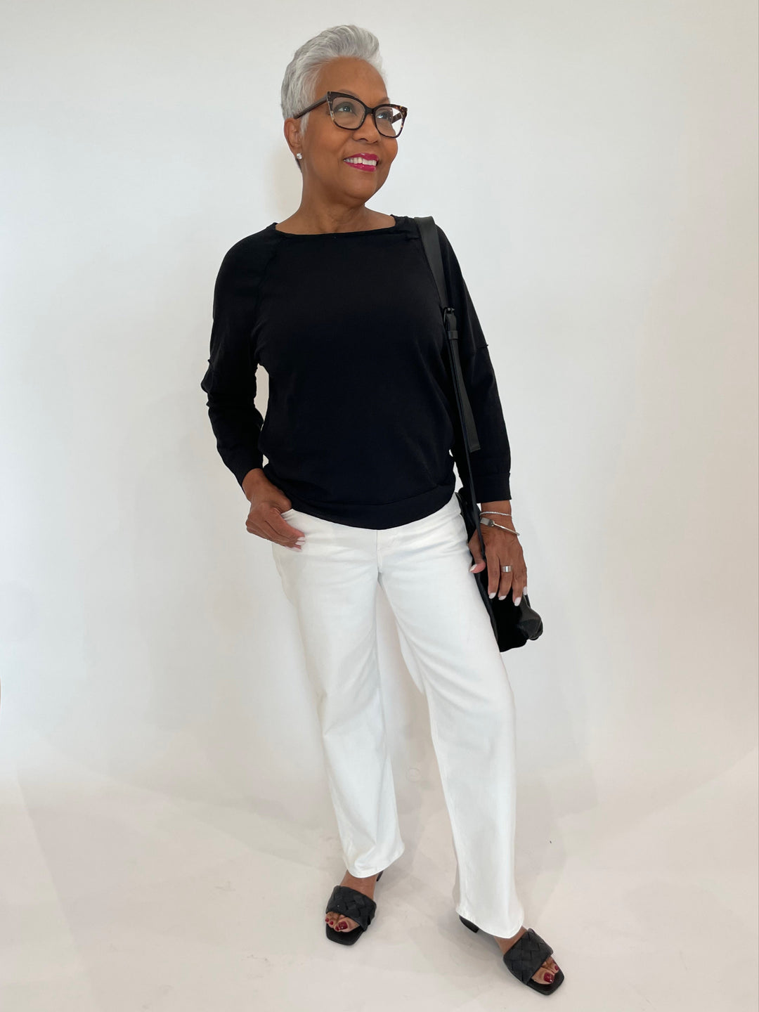 Elliott Lauren Lucy Raglan Sleeve Tee With Seam Detail in Black paired with Citizens of Humanity Palma Straight Jeans in Soft White available at Barbara Katz