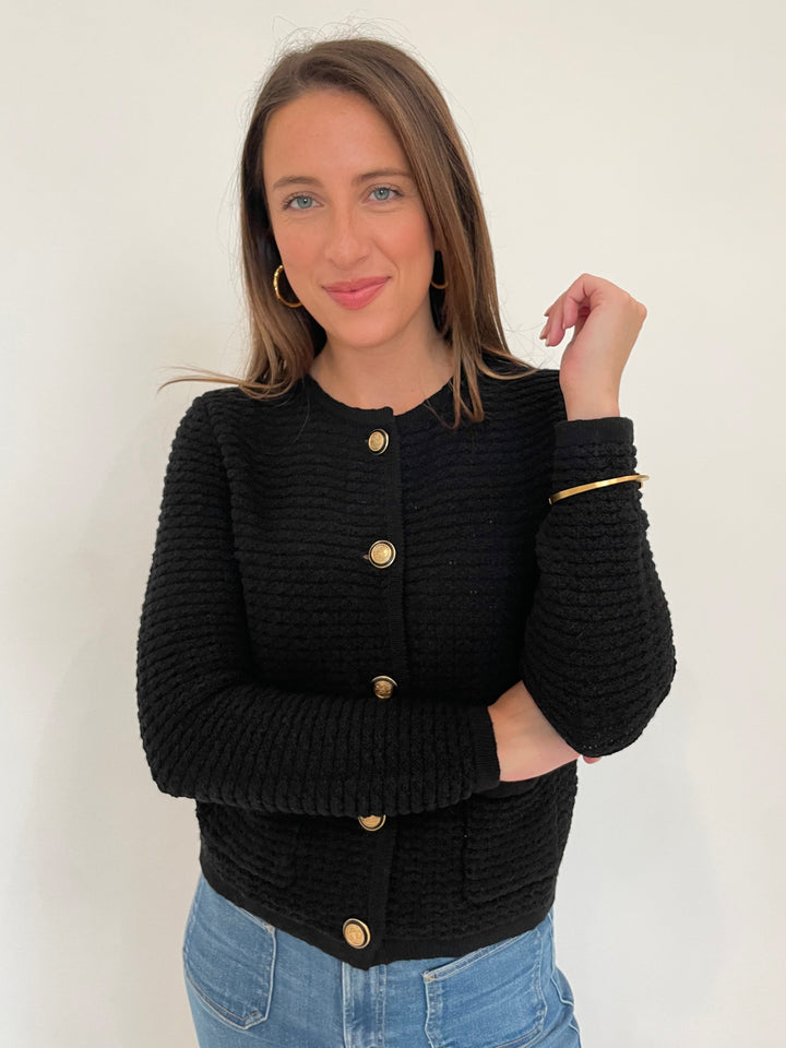 Elliott Lauren Top Priority Button Front Textured Cardigan in Black with Alexis Bittar Gold Brut Tube Hoop Earrings and Dean Davidson Gold Crosby Hinged Bracelet available at Barbara Katz