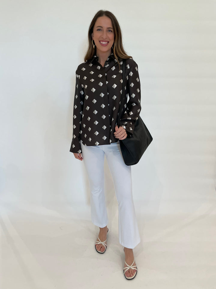 Max Mara MM Zelig Blouse in Mud Geo paired with White Jeans and Daniella Lehavi Capri Envelope Bag in Black available at Barbara Katz
