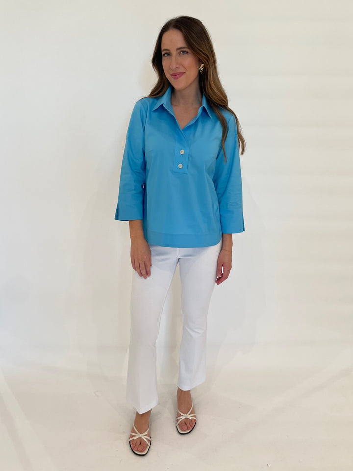 Hinson Wu Aileen 3/4 Sleeve Button Back Top in Ceramic Blue paired with Lysse Ankle Denim Baby Bootcut Pants in White available at Barbara Katz