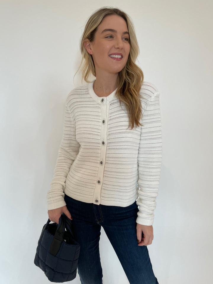 Autumn Cashmere Solid Textured Stripe Jacket in Bleach White paired with Mother The Insider Crop Step Fray Jeans in Off Limits, Vee Collective Porter Mini Tote Bag in Deep Sea available at Barbara Katz