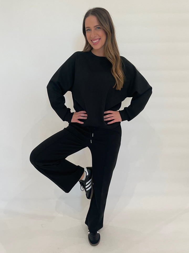 BK Soft Touch Raglan Sweatshirt in Black paired with matching BK Drawstring Sweatpants in Black available at Barbara Katz