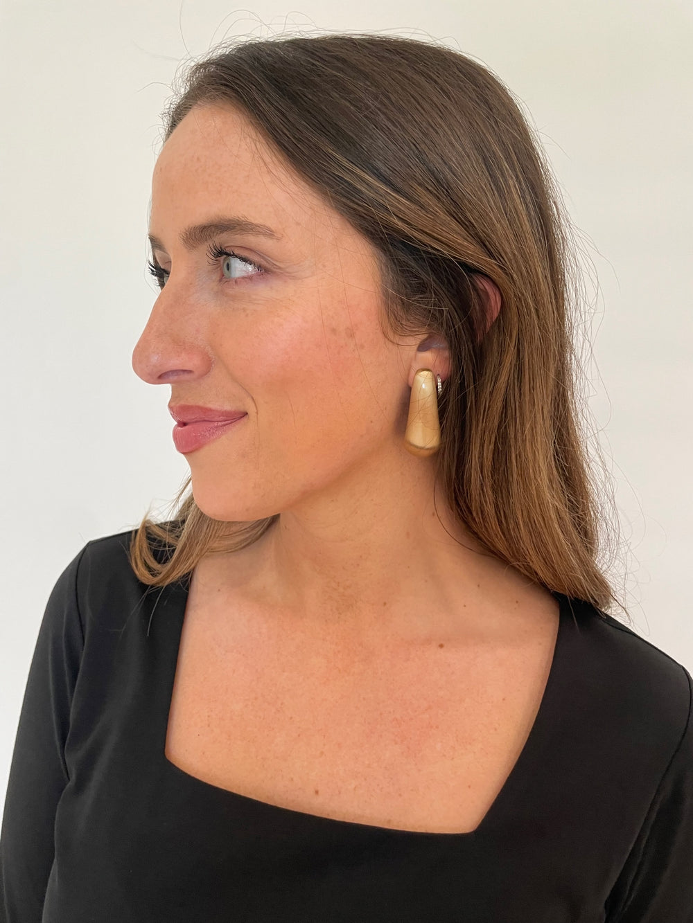 BK Jewelry Suzie Satin Long Teardrop Hoop Earrings in Satin Silver available at Barbara Katz