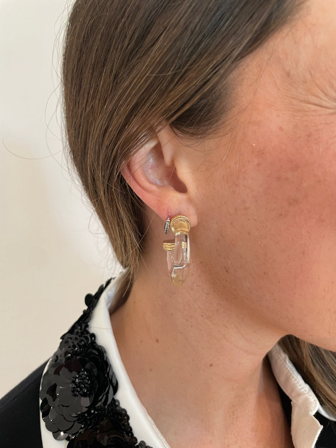 BK Jewelry Mika Metal Accent Clear Hoop Earrings in Clear/Vintage Gold available at Barbara Katz