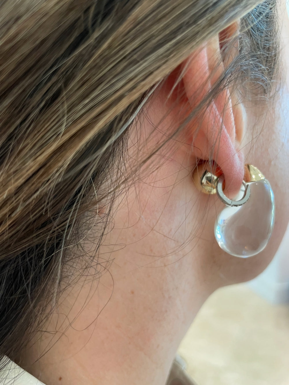BK Jewelry Pila Pear Shape Ice Ball Hoop Earrings in Clear/Gold available at Barbara Katz