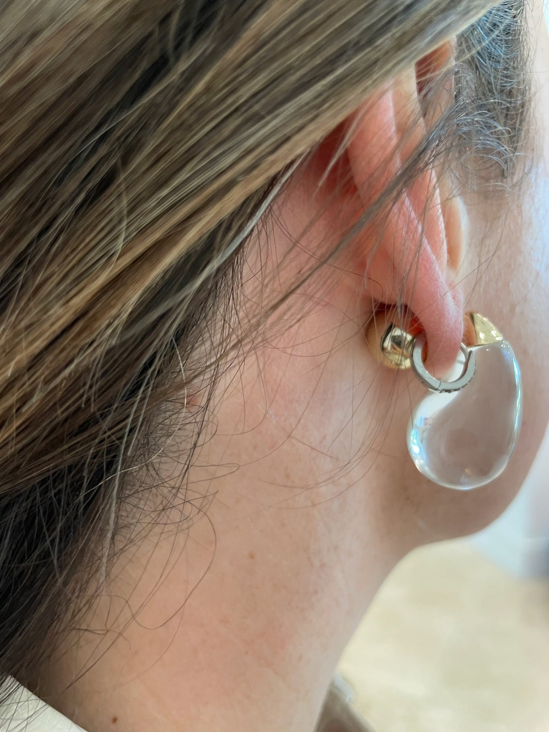BK Jewelry Pila Pear Shape Ice Ball Hoop Earrings in Clear/Gold available at Barbara Katz