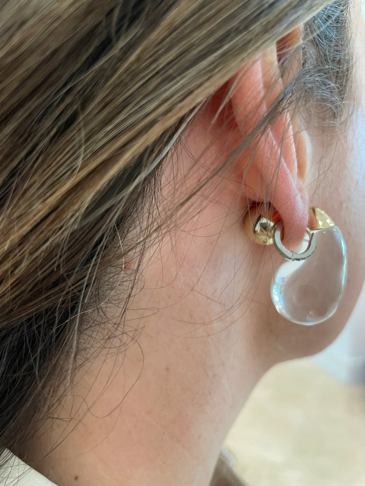 BK Jewelry Pila Pear Shape Ice Ball Hoop Earrings in Clear/Gold available at Barbara Katz