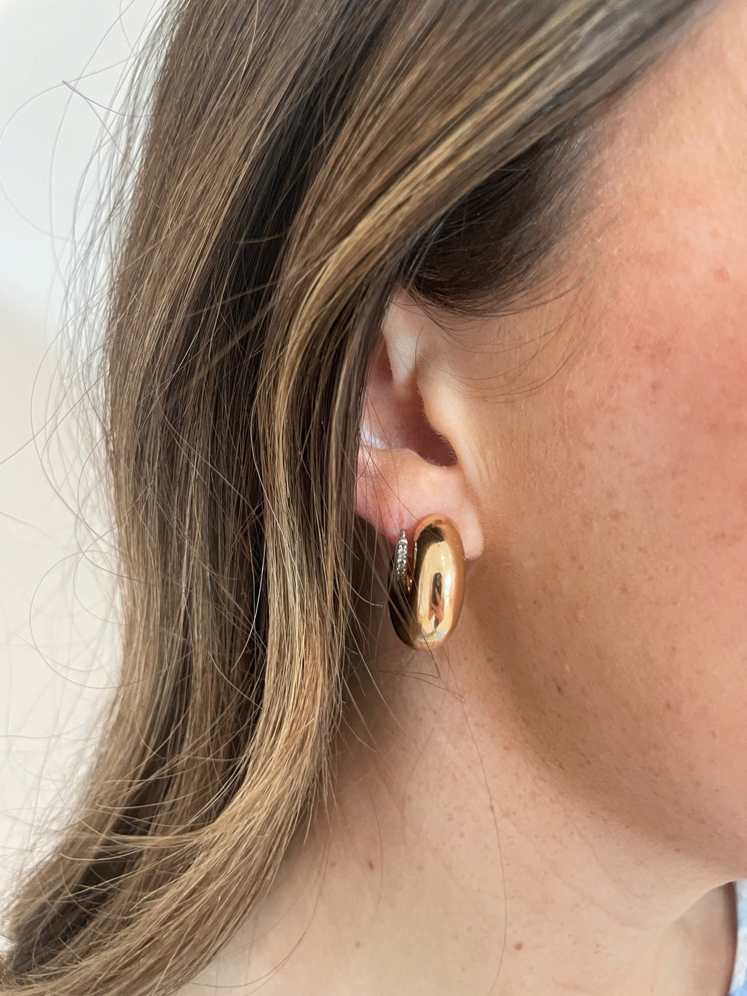 BK Jewelry Tina Thick Metal Hoop Earrings in Gold available at Barbara Katz