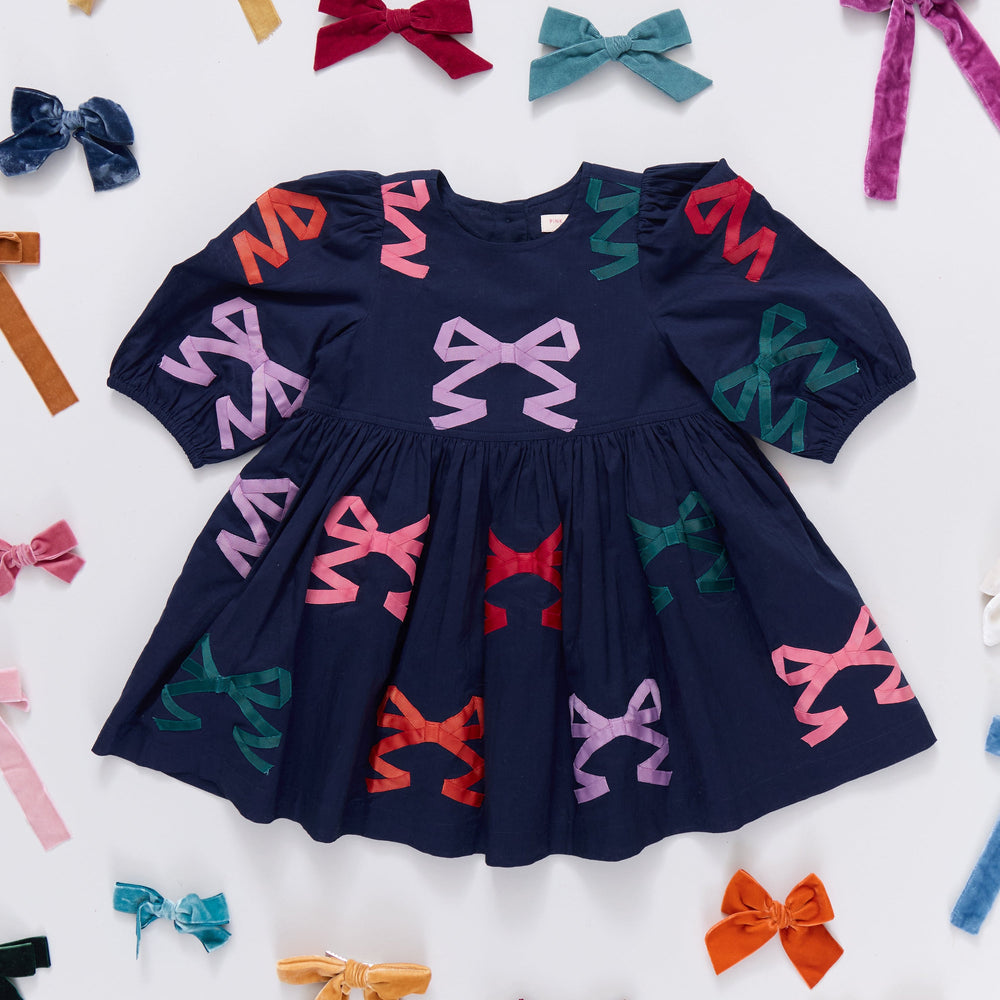 Pink Chicken Girls Brooke Dress in Multi Bow Applique available at Barbara Katz