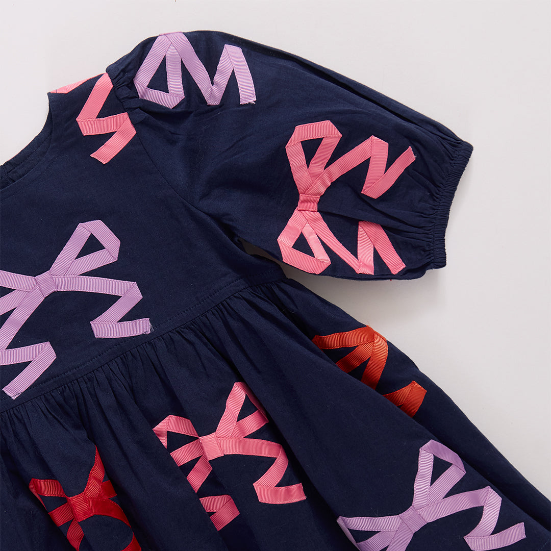 Pink Chicken Girls Brooke Dress in Multi Bow Applique available at Barbara Katz