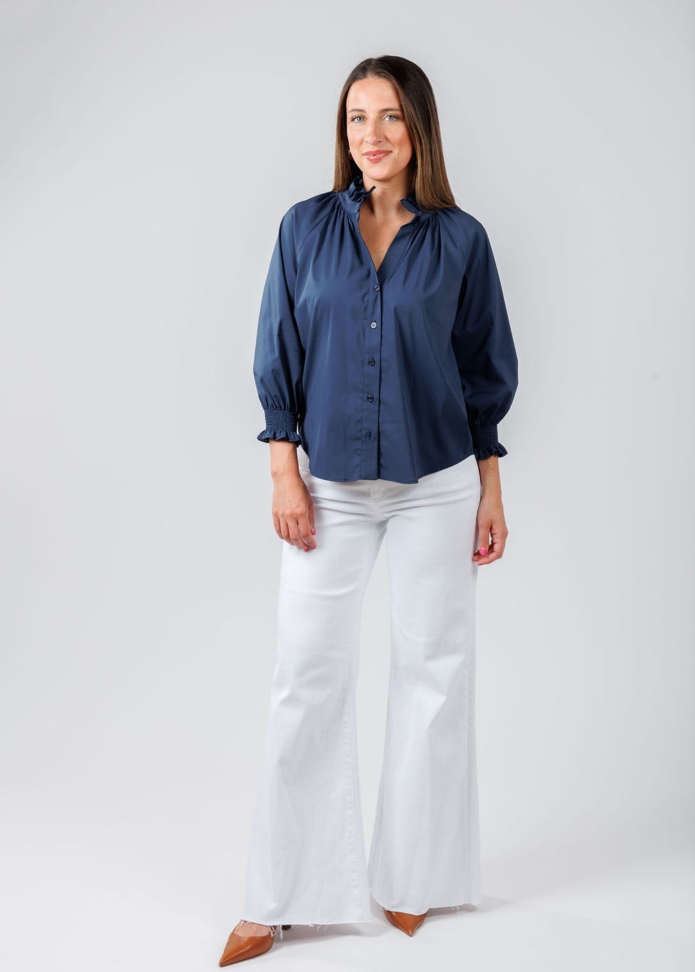 Finley Fiona Solid Silky Poplin Shirt in Navy paired with Pistola Izzy Wide Leg Crop Jeans in Vivid White available at Barbara Katz