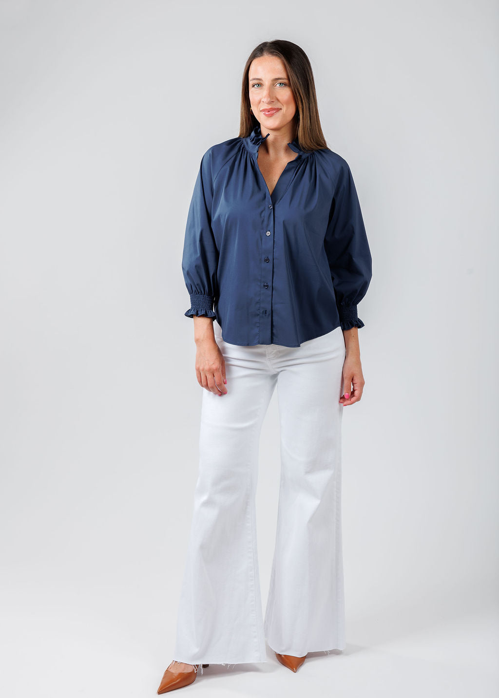 Finley Fiona Solid Silky Poplin Shirt in Navy paired with Pistola Izzy Wide Leg Crop Jeans in Vivid White available at Barbara Katz