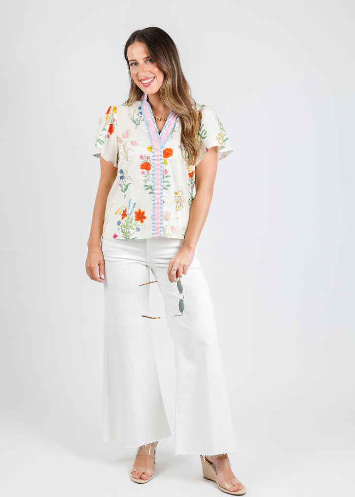 BK Short Sleeve Floral Top in Cream Multi paired with Frame Le Palazzo Crop Jeans in Au Natural Clean Raw After available at Barbara Katz