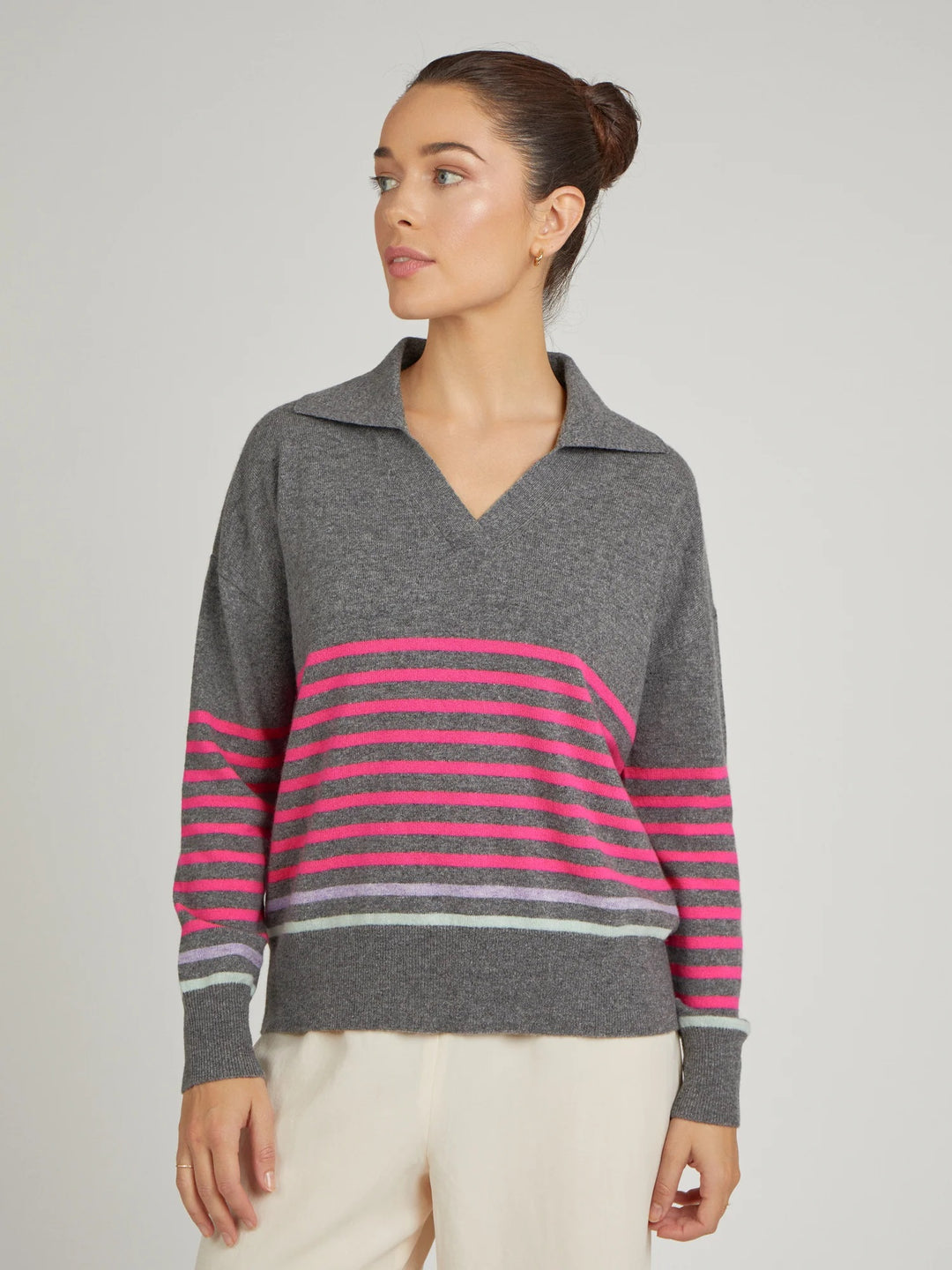 Cocoa Cashmere -The Frankie Collared Sweater is knitted in melange yarn with vibrant pink stripes and contrasting pastel stripes at the hem. 