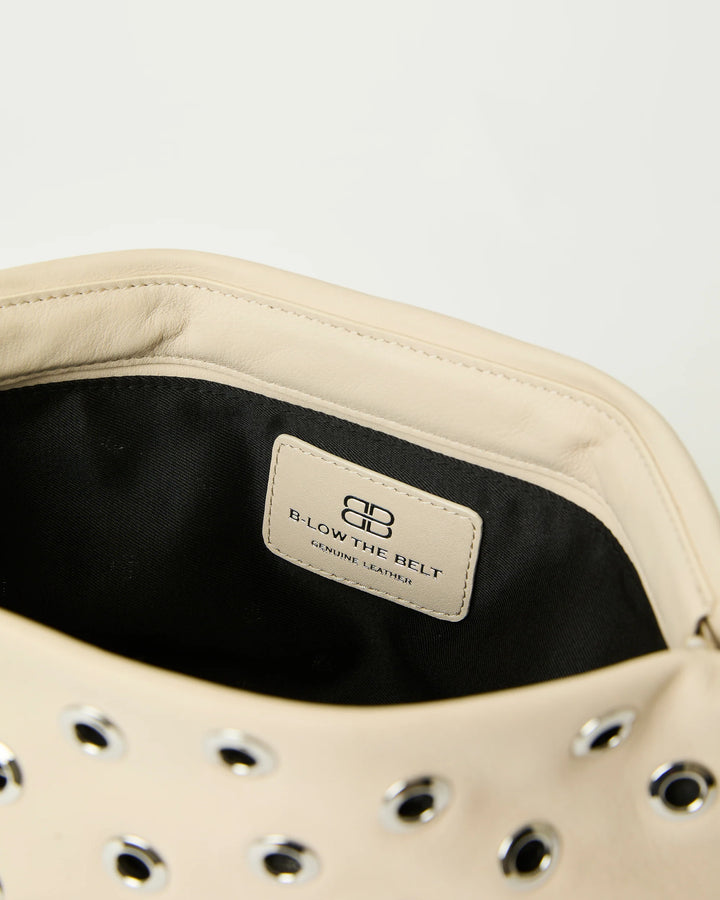 B-Low The Belt Gia Grommet Leather Clutch Bag in Bone Silver available at Barbara Katz