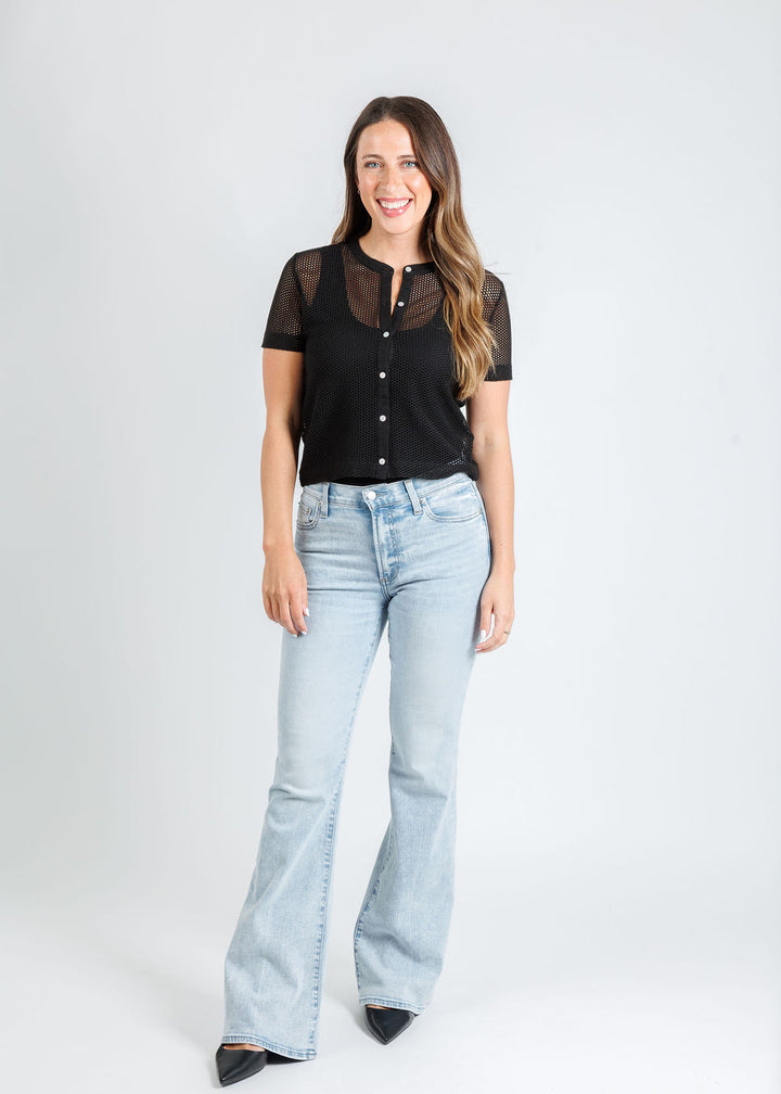 Goldie High Roller Fishnet Crop Button Up Shirt in Black paired with Pistola Kinsley Mid Rise Ultra Flare Jeans in Serenity available at Barbara Katz