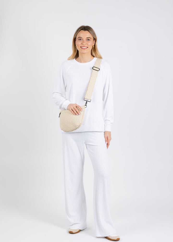Goldie Life of Luxury Terry Crew Sweatshirt and Terry Flare Pants in White available at Barbara Katz