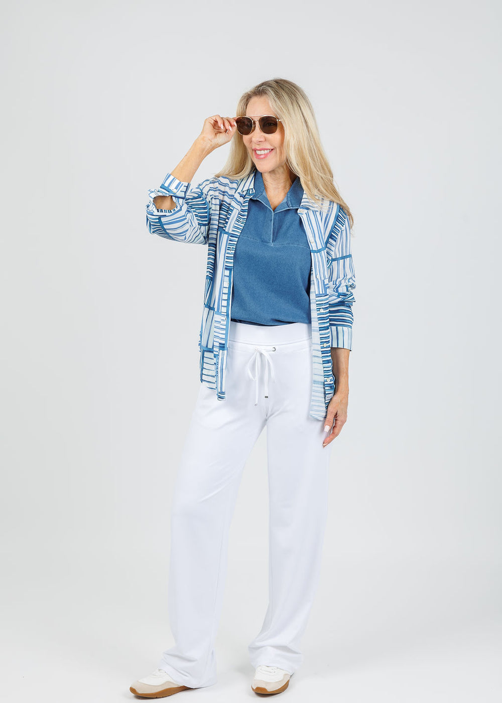 Hinson Wu Emma Sleeveless Knit Denim Foundation Layer in Medium Wash layered with Rails Josephine Shirt in Marine Mixed Stripe, paired with Raffaello Rossi Candice Straight Pants in White available at Barbara Katz