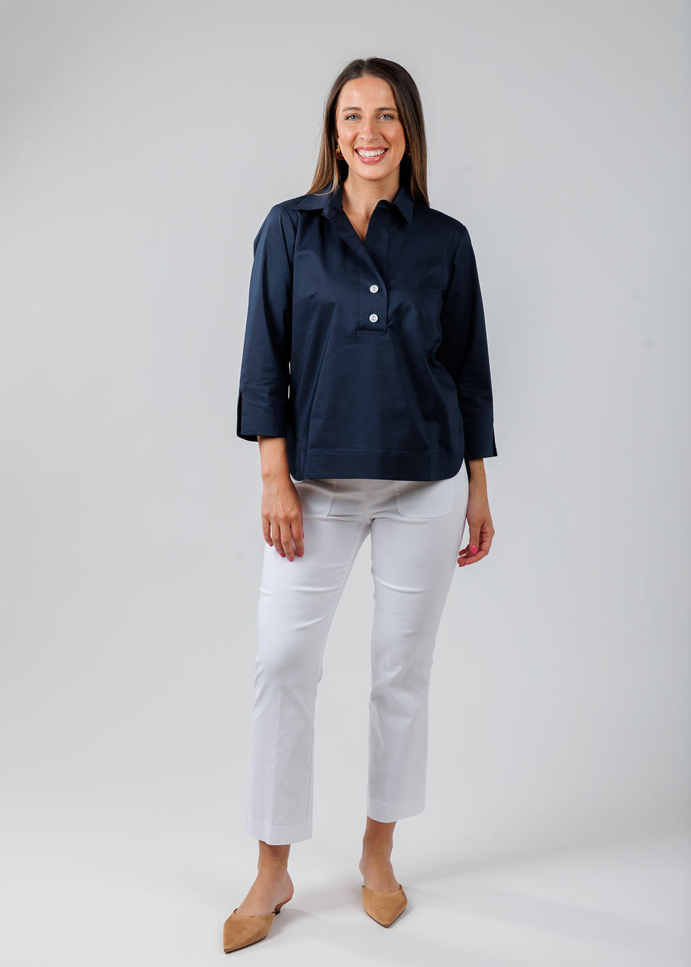 Hinson Wu Aileen 3/4 Sleeve Button Back Top in Navy paired with Elliott Lauren Baby Boot Pant With Patch Pocket in White available at Barbara Katz