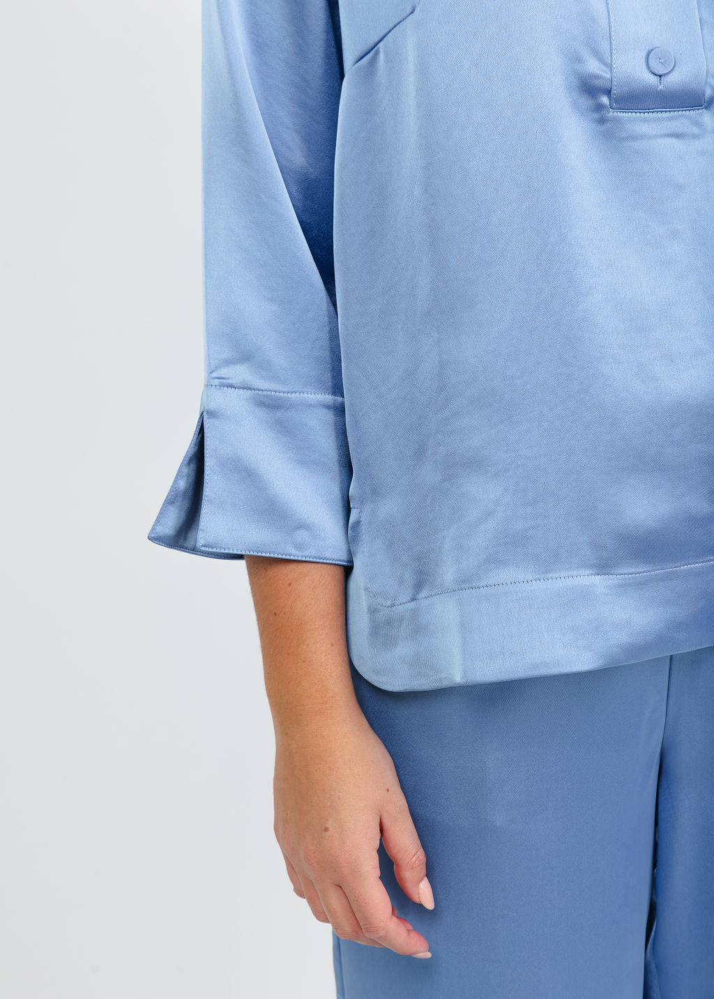Hinson Wu Aileen 3/4 Sleeve Liquid Satin Top in Sky Blue available at Barbara Katz