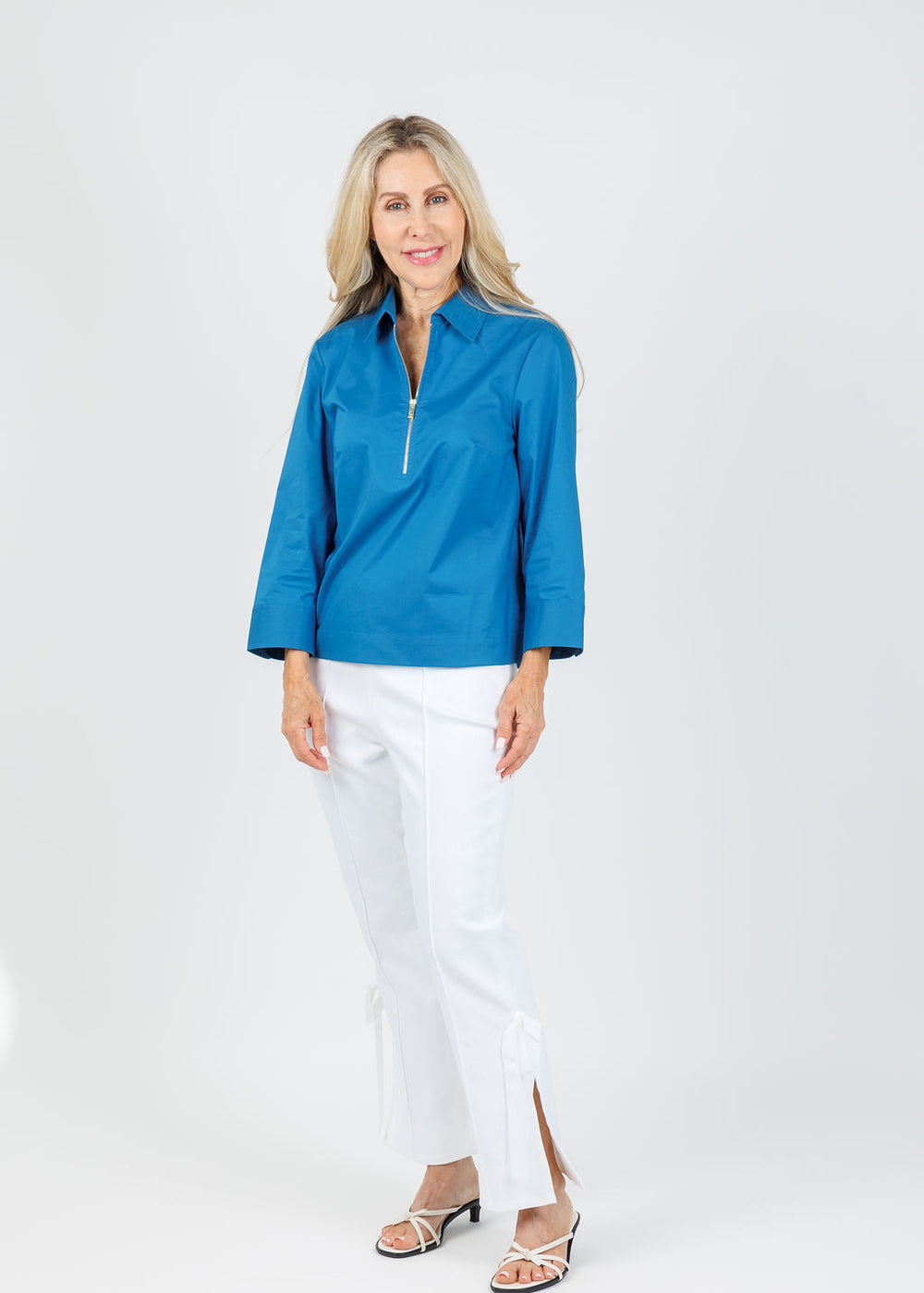 Hinson Wu Alessa 3/4 Sleeve Shirt in Sapphire paired with Cinq a Sept Denim Lou Pants in White available at Barbara Katz