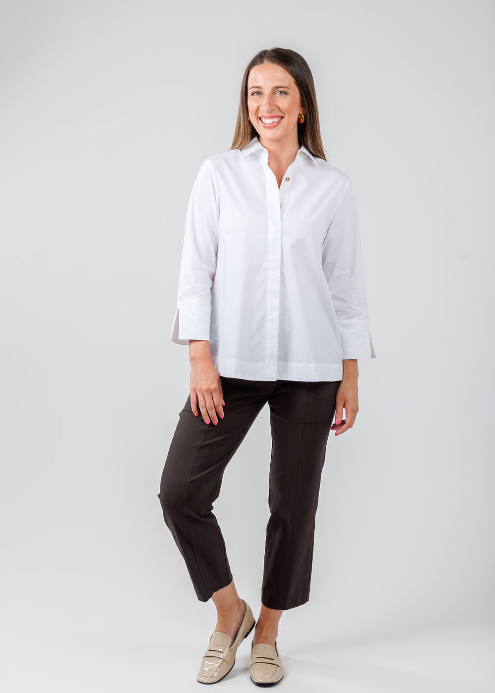 Hinson Wu Xena 3/4 Sleeve Zip-Back Shirt in White paired with Elliott Lauren Crop Cargo Pants With Rivet Details in Chocolate available at Barbara Katz