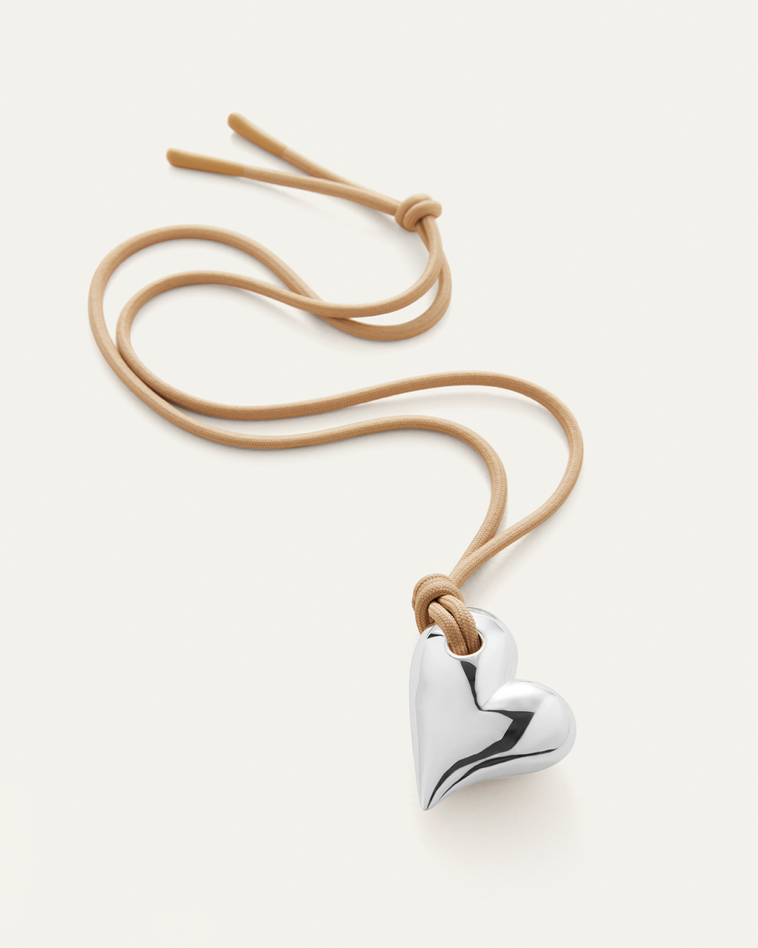 Jenny Bird Art Heart On A String Necklace in Silver available at Barbara Katz