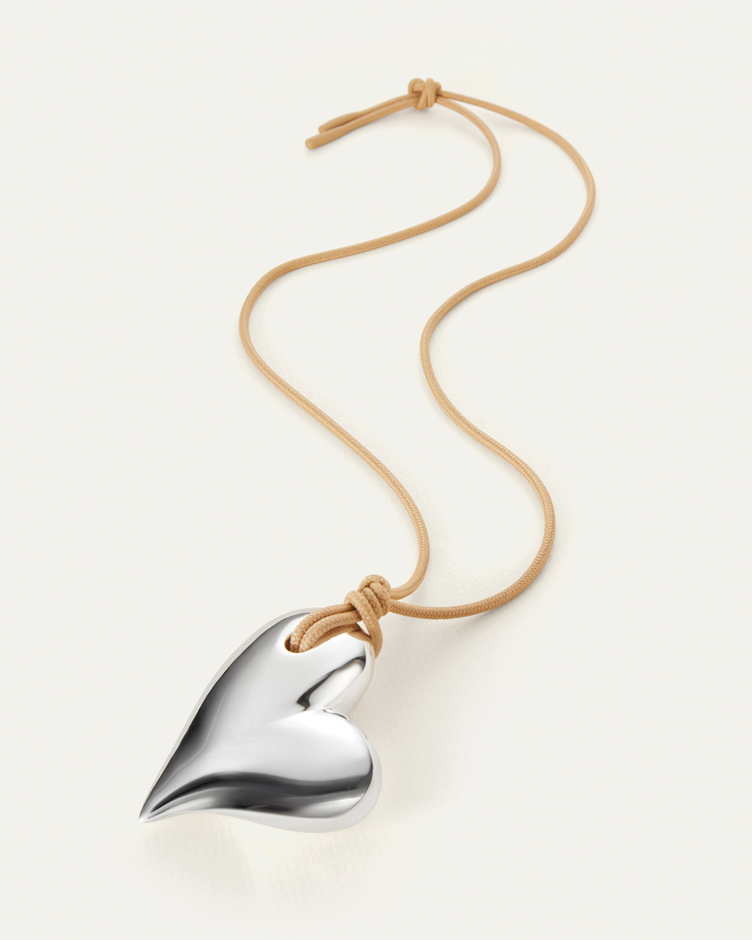 Jenny Bird Mega Art Heart On A String Necklace in Silver available at Barbara Katz