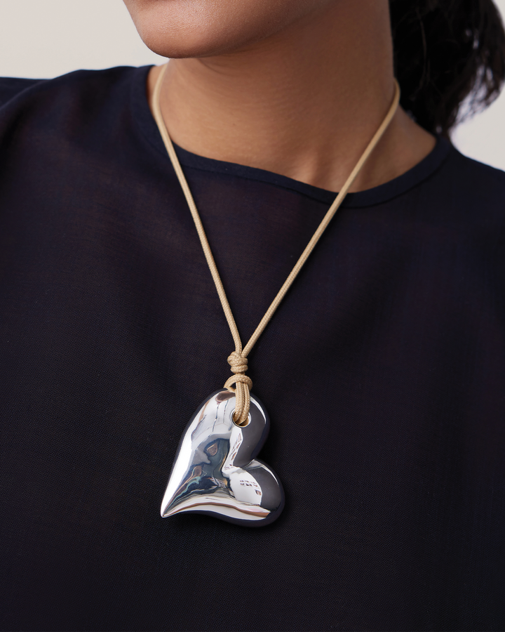 Jenny Bird Mega Art Heart On A String Necklace in Silver available at Barbara Katz