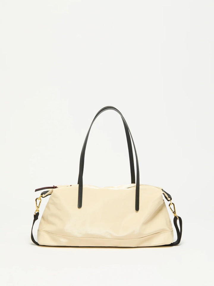 Jack Gomme Anais Baguette Bag in Crema with Black Trim available at Barbara Katz