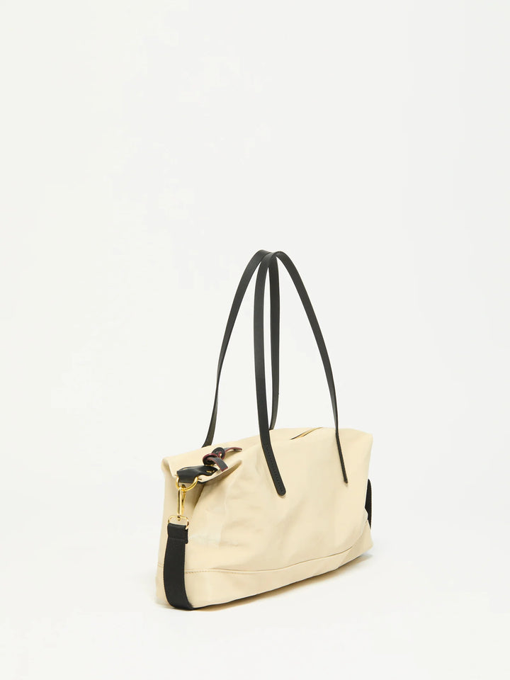 Jack Gomme Anais Baguette Bag in Crema with Black Trim available at Barbara Katz