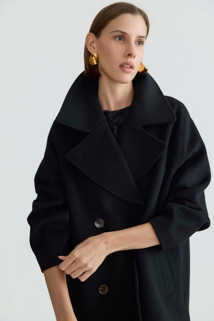 Adroit Atelier Jordan Double-Breasted Raglan Sleeve Wool Blend Coat in Black available at Barbara Katz