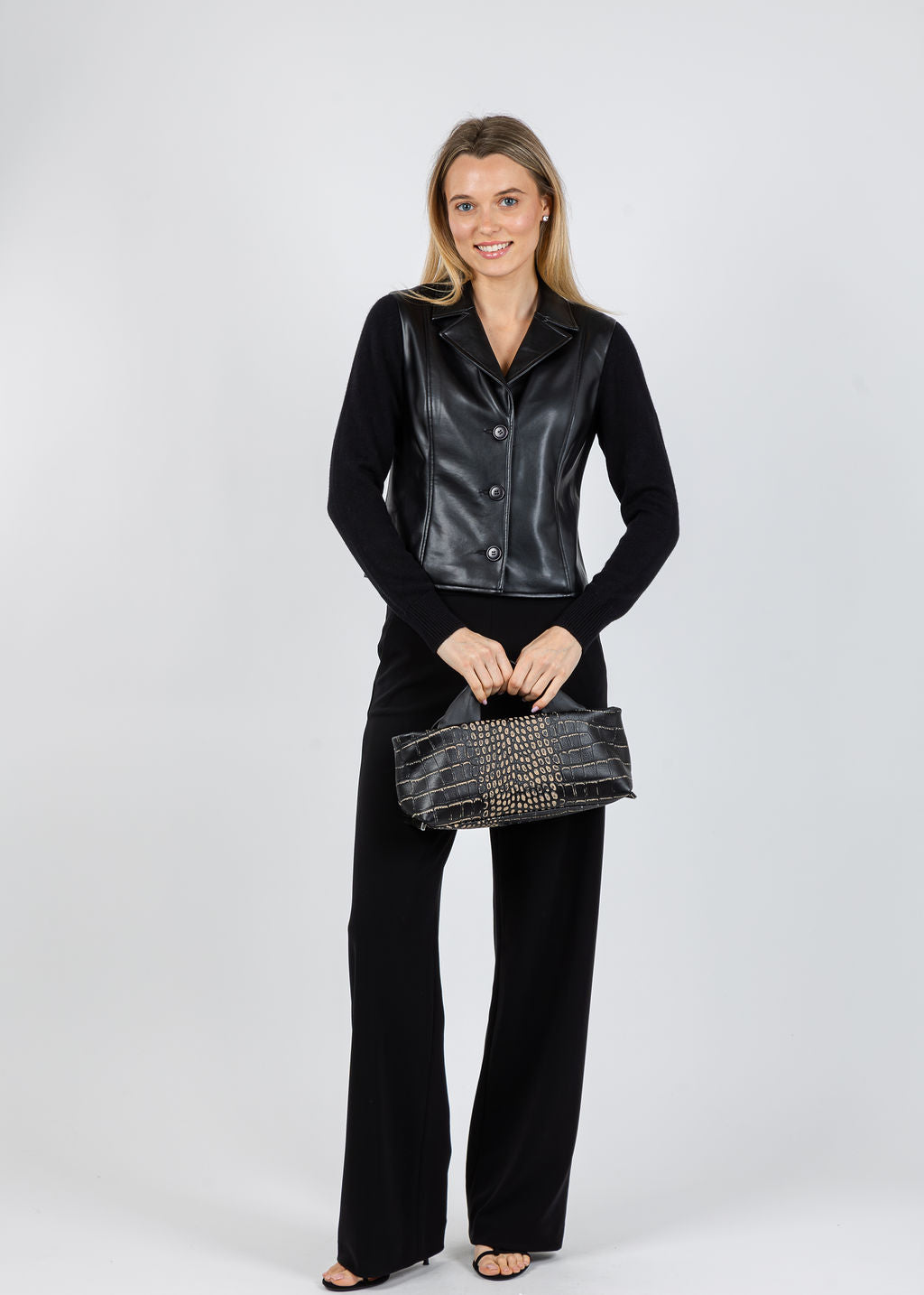 J Society Knit Sleeve Vegan Leather Jacket in Black available at Barbara Katz
