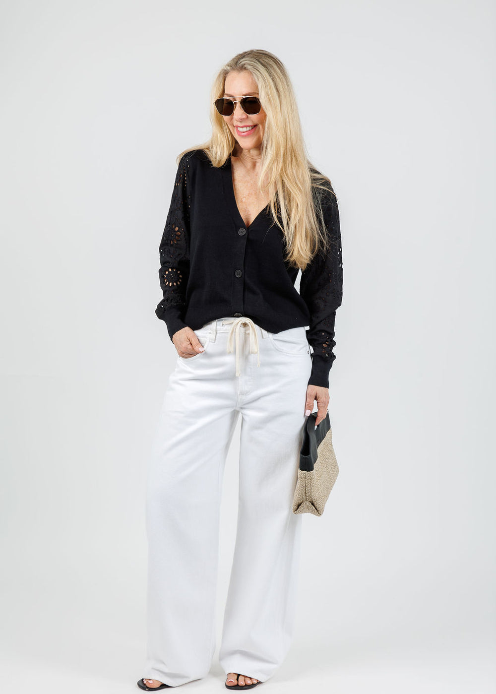 J Society Eyelet Sleeve Cardigan in Black paired with Brynn Trousers in White available at Barbara Katz