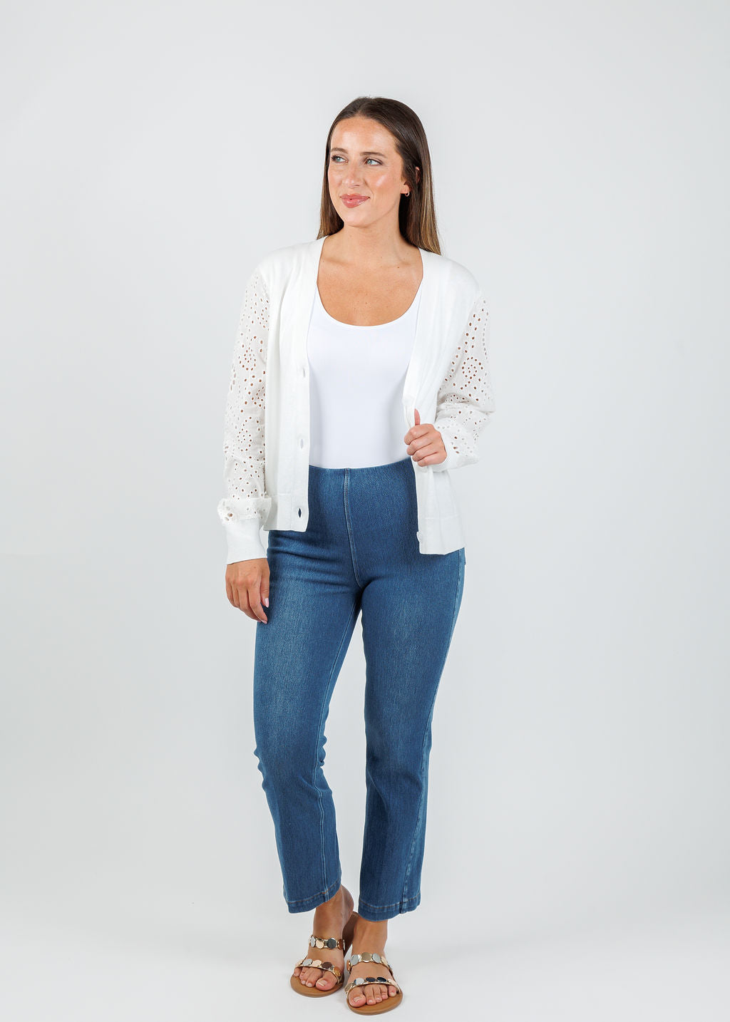 J Society Eyelet Sleeve Cardigan in White with white A'Nue The Classic Micro Tank Top underneath, paired with Lysse Ankle Denim Baby Bootcut Pants in Midwash available at Barbara Katz