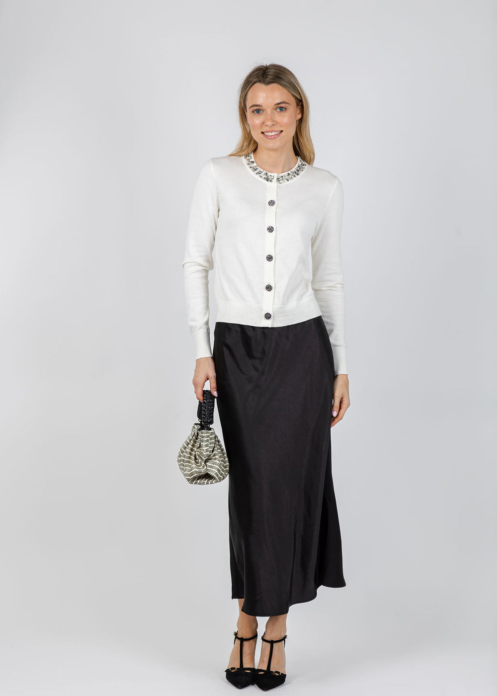 J Society Bella Jewel Neck Cardigan in Vanilla paired with J Society Satin Long Skirt in Black available at Barbara Katz