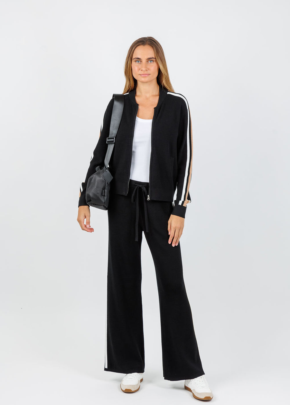J Society Side Stripe Zip Up Sweater in Black paired with matching Side Stripe Pants available at Barbara Katz