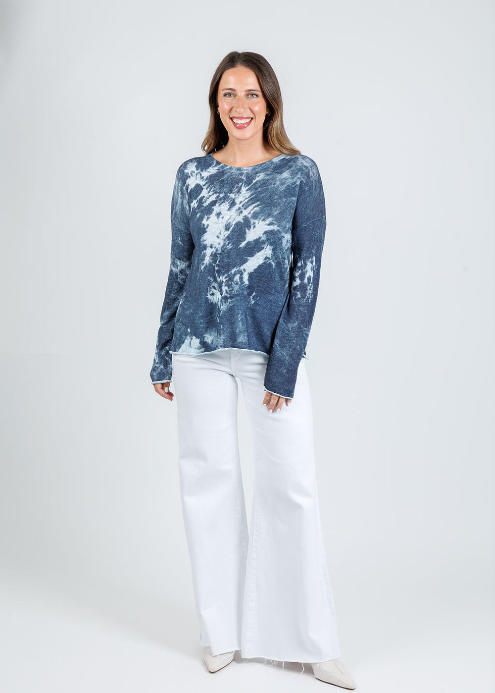 J Society Tie Dye Long Sleeve Crew Sweater in Denim paired with Pistola Izzy High Rise Wide Leg Jeans in White available at Barbara Katz