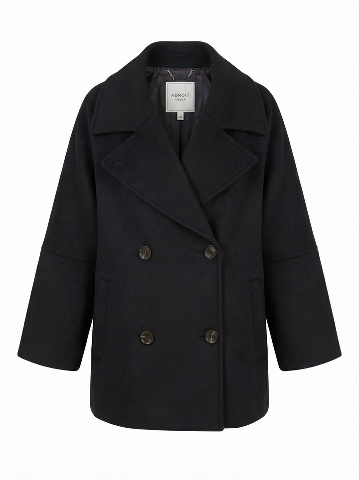 Adroit Atelier Jordan Double-Breasted Raglan Sleeve Wool Blend Coat in Black available at Barbara Katz