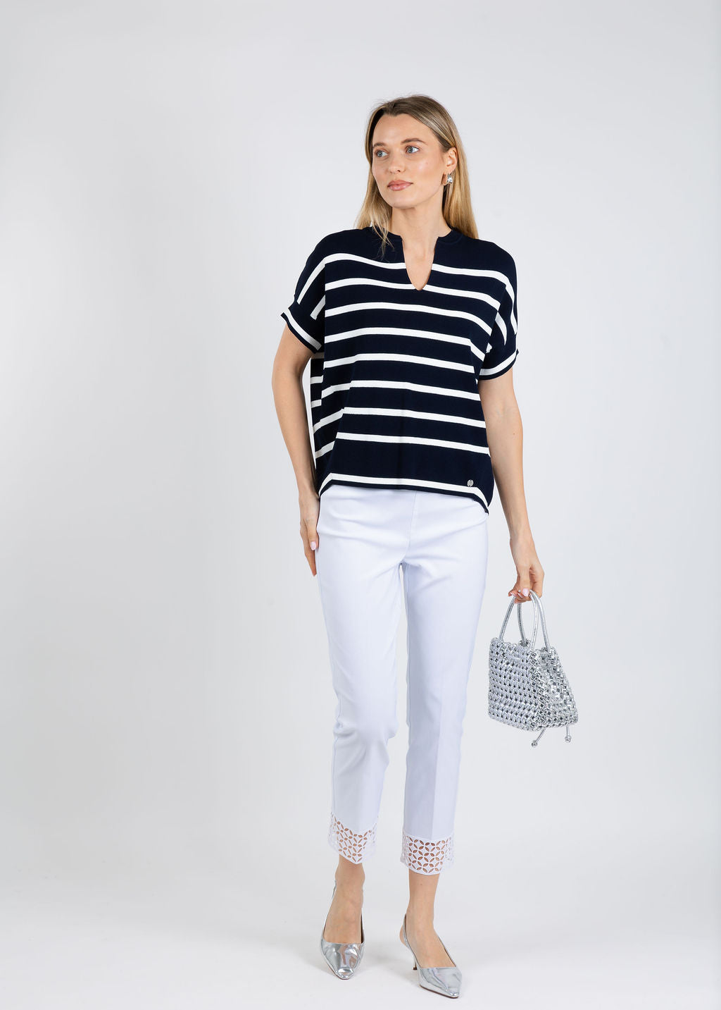 Joseph Ribkoff Stripe Short Sleeve Sweater in Midnight Blue/Vanilla paired with Joseph Ribkoff Millennium Pull-On Crop Pants in White available at Barbara Katz