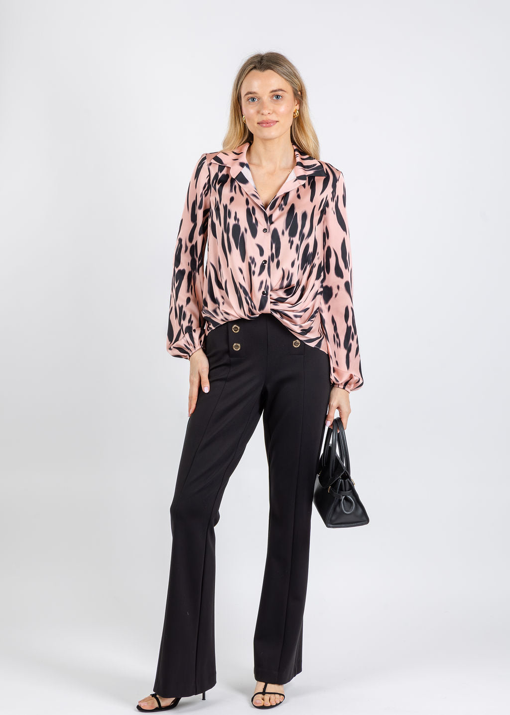 Joseph Ribkoff Recycled Satin Animal Print Draped Top in Pink/Black paired with Joseph Ribkoff Heavy Knit Flared Pull-On Pants in Black available at Barbara Katz