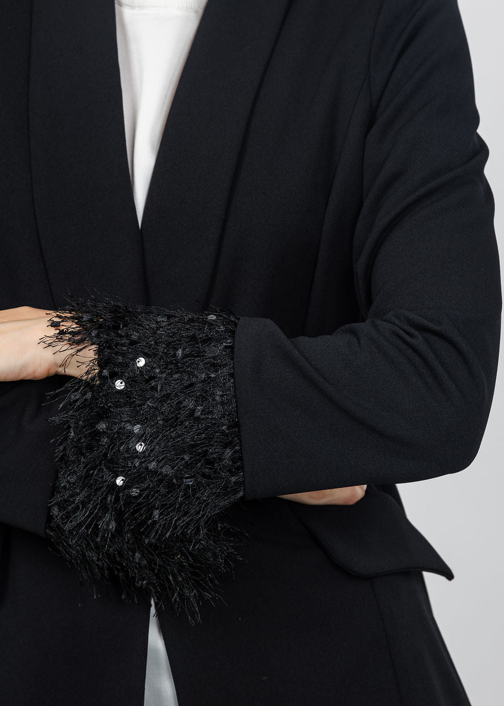 Joseph Ribkoff Scuba Crepe Fringe Cuff Blazer in Black available at Barbara Katz