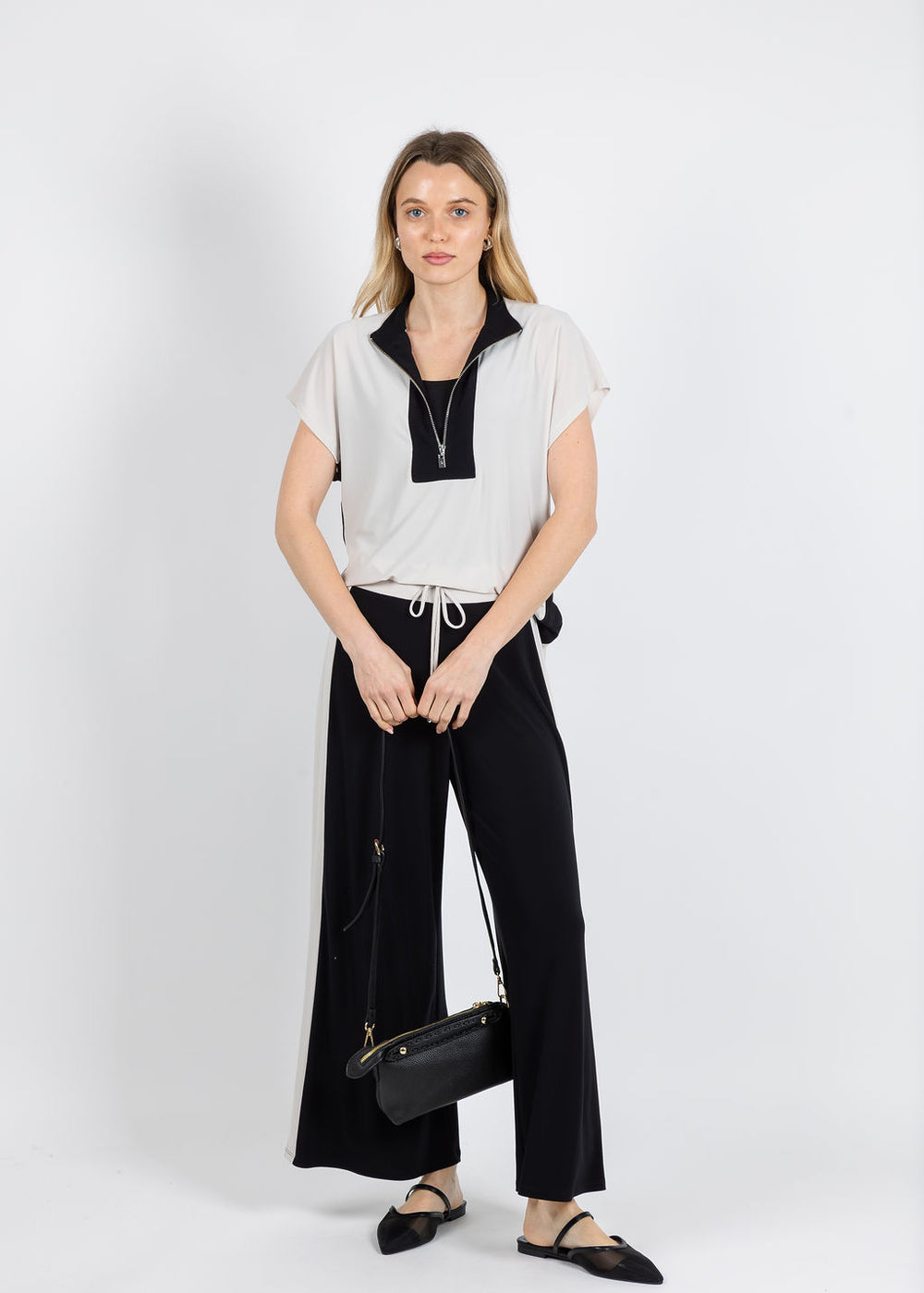 Joseph Ribkoff Silky Knit Color Block Straight Top in Moonstone/Black paired with matching Joseph Ribkoff Silky Knit Color Block Wide Leg Pull-On Pants available at Barbara Katz