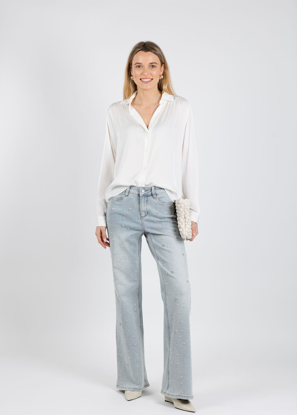 Repeat Silk Blouse in Cream paired with Joseph Ribkoff Wide Leg Jeans With Pearl and Rhinestones in Light Blue Denim available at Barbara Katz