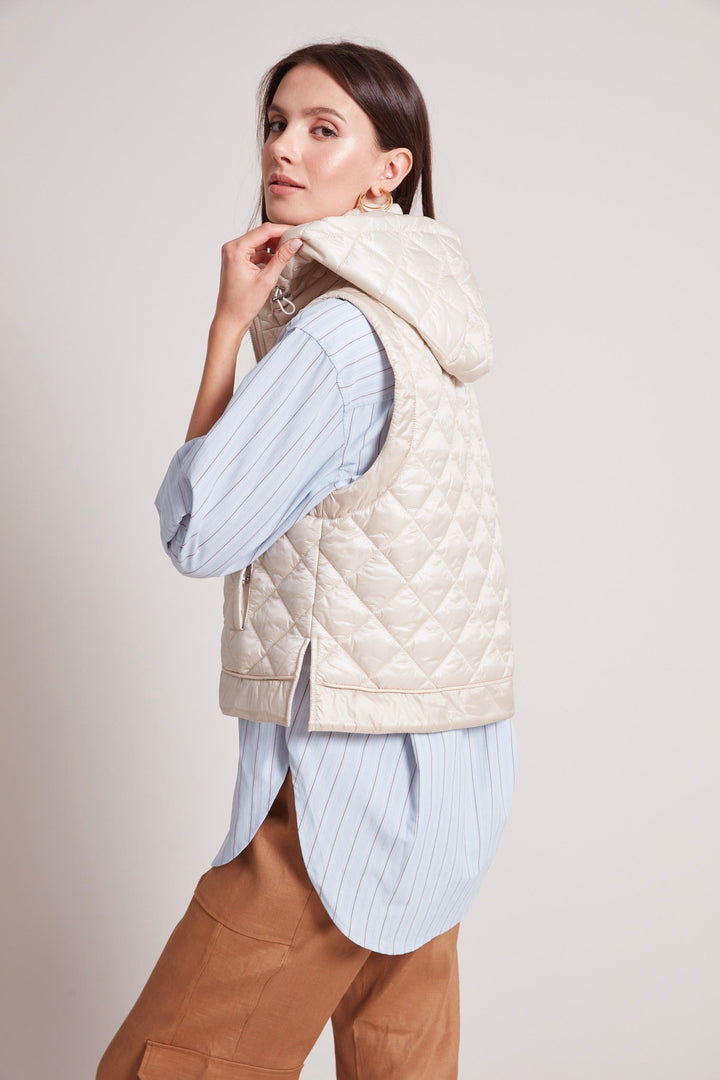 Adroit Atelier Talia Quilted Gilet With Removable Hood in Champagne available at Barbara Katz